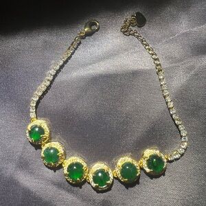 Elegant Gold and Green Bracelet